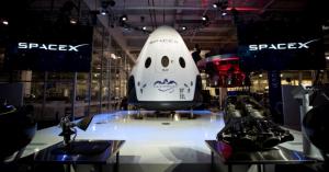 SpaceX pushes first crewed launch of Dragon capsule to 2018