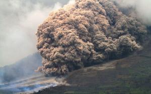 Volcano Mount Sinabung in Sumatra, Indonesia erupts spewing lava and ash