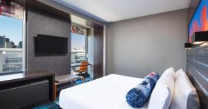 Amazon’s Alexa and Apple’s Siri are waging war over the hotel room